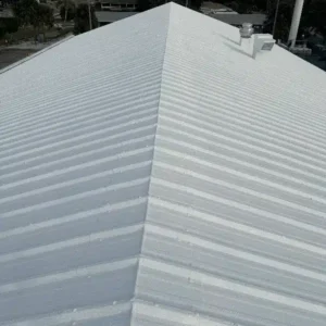Damaged traditional roof section alongside a spray foam retrofit solution for insulation and durability.
