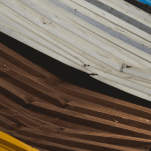 a close-up of warped metal roof panels showing signs of oil canning, which can affect both aesthetics and water drainage efficiency.