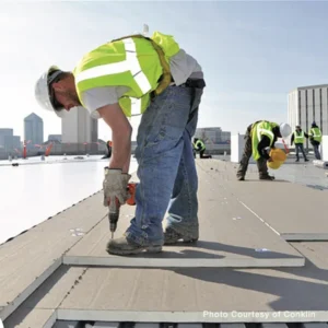Conklin Roof Maintenance Guide with man fixing a roofing panel
