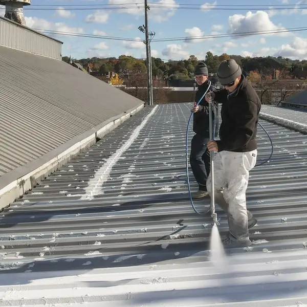 Roof Repair spraying on the Conklin Seal